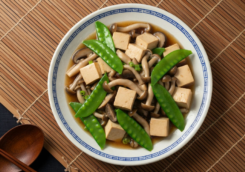 Braised Silken Tofu with Mixed Mushrooms and Snow Peas in Vegetarian Oyster Sauce