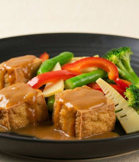 Braised Tofu Puffs with Mixed Vegetables and Satay Sauce