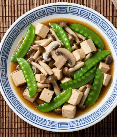 Braised Tofu with Mixed Mushrooms and Snow Peas in Vegetarian Oyster Sauce