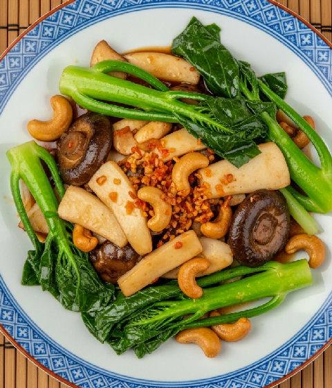 Stir-fried King Oyster Mushrooms with Gai Lan and Cashew Nuts in Vegetarian XO Sauce